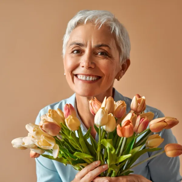 Woman discussing menopause with her clinician via telehealth